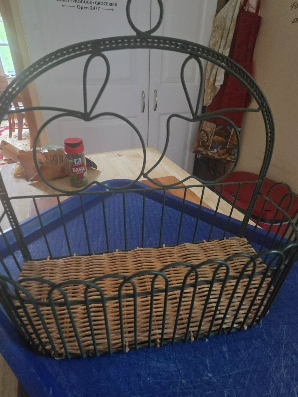 vintage wire basket shelf with wicker and apple detail